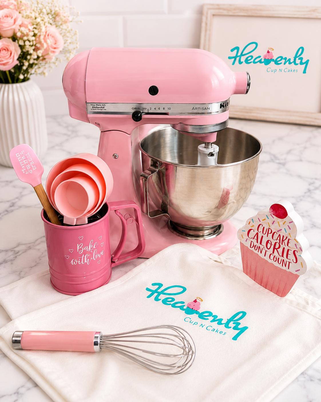 Heavenly Cup N Cakes branded baking setup with pink KitchenAid mixer